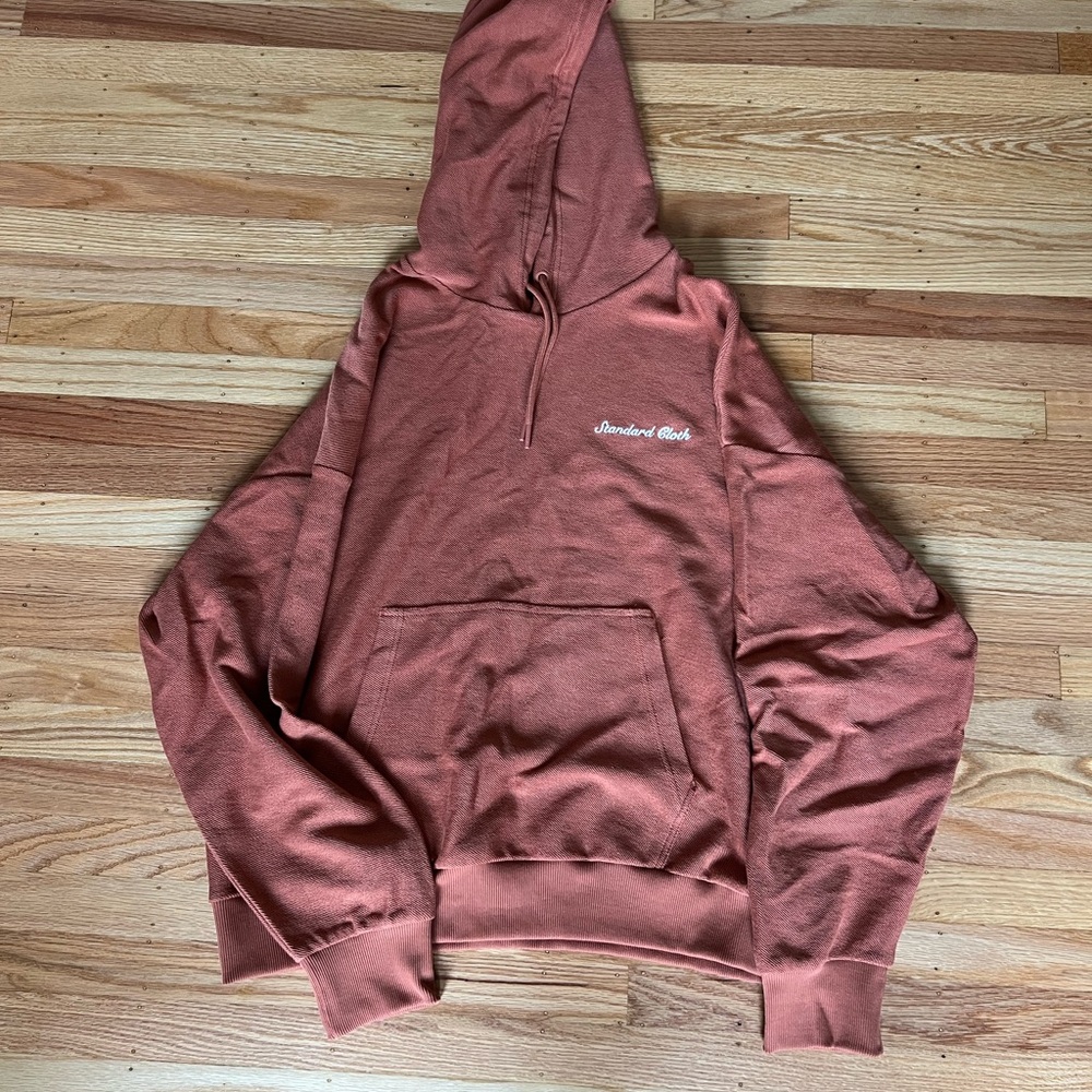 Brown Sweater with Ribbed Cuffs and Soft Material